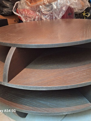 Coffee table used, round shape with storage compartments