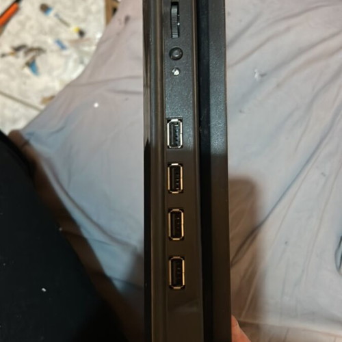 Laptop base compatible with various cables
