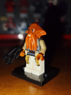 Quarren Lego minifigure with blaster and stand
