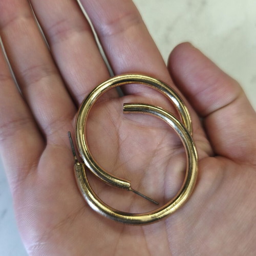 Gold hoop earrings medium size used