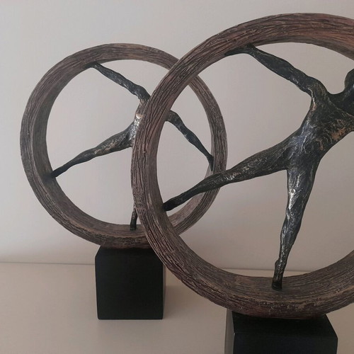 Decorative set 2 people on wheel like new