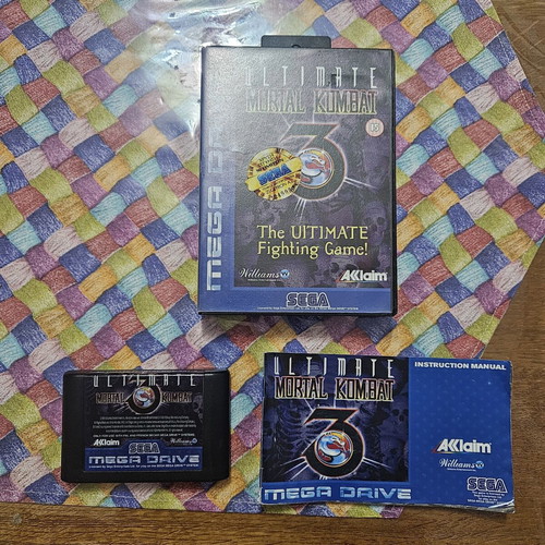 Mega Drive Ultimate Mortal Kombat 3 game like new with manual