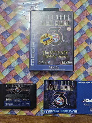 Mega Drive Ultimate Mortal Kombat 3 game like new with manual