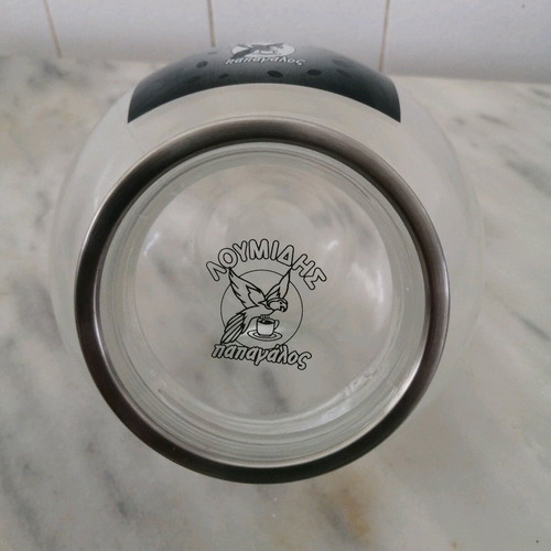 Collectible glass jar "Papagalos Loumidis" like new