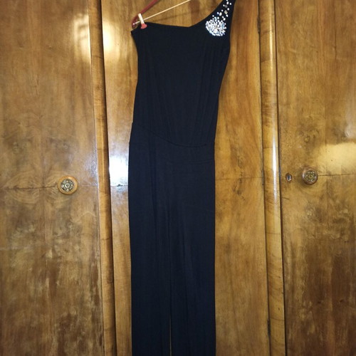Women's jumpsuit used, size L, black with stones and zipper