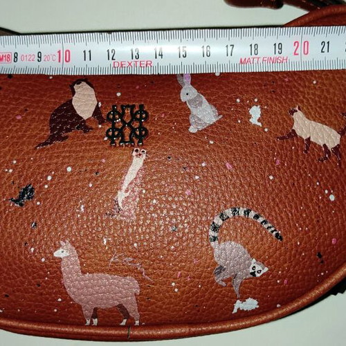 Kem crossbody bag brown new with animal designs and zipper