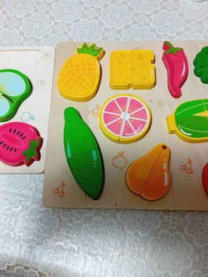 Wooden educational puzzle set like new, 2 puzzles with fruit pieces