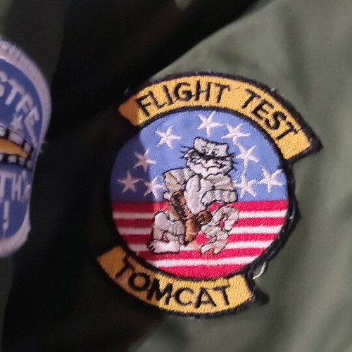 Flight jacket with embroidered patches like new, size 12