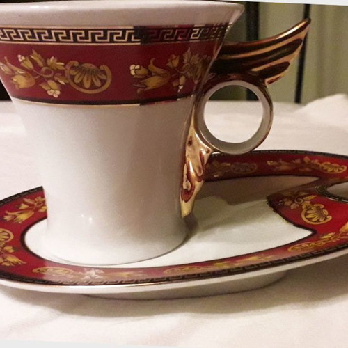 Pair of Limoges cups in white and red with gold and saucers new