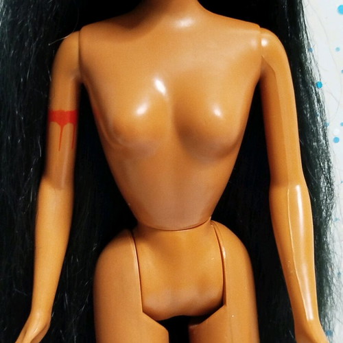 Pocahontas doll by Mattel used with flaws