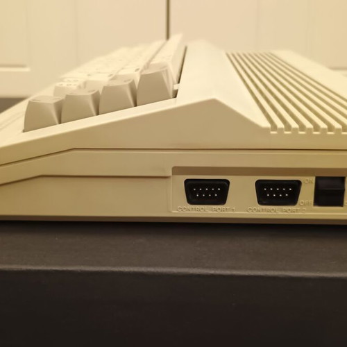 Commodore 64C used with original power supply, cassette player, and manuals