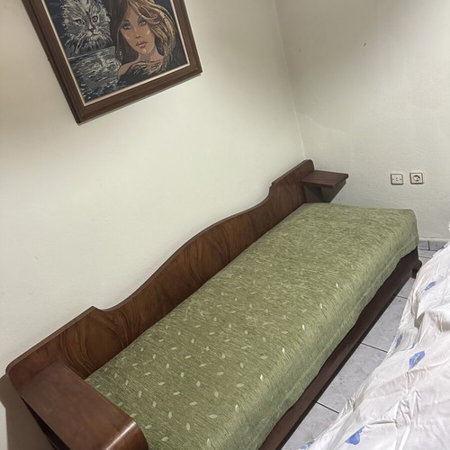Vintage single sofa bed with storage and side shelf