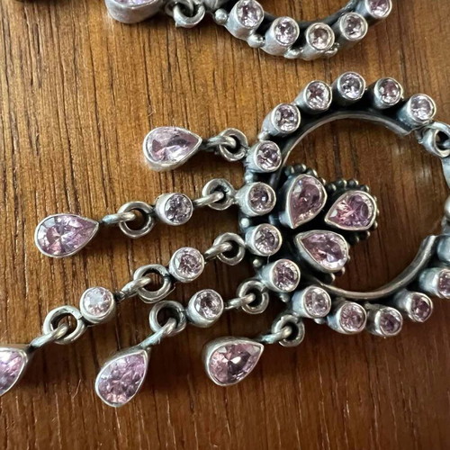 Silver chandelier earrings used with pink semi-precious stones