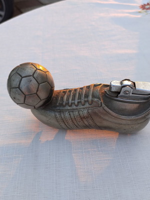 Sports collectible lighter shaped like a shoe with ball, like new