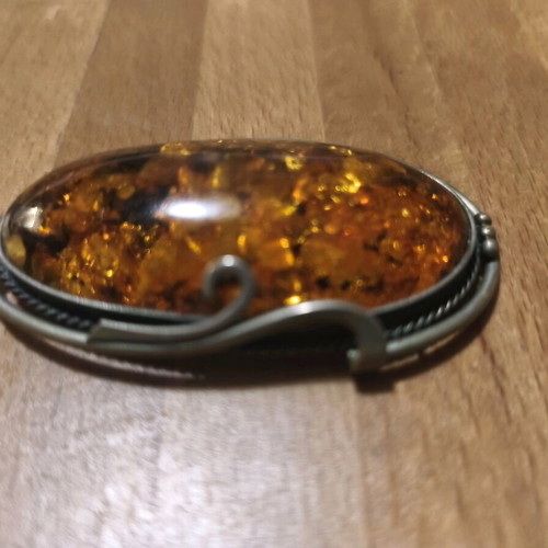 Amber brooch like new, weight 26 grams, length 6.5cm