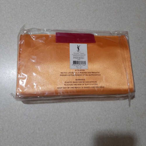 Yves Saint Laurent clutch bag new, vintage, orange