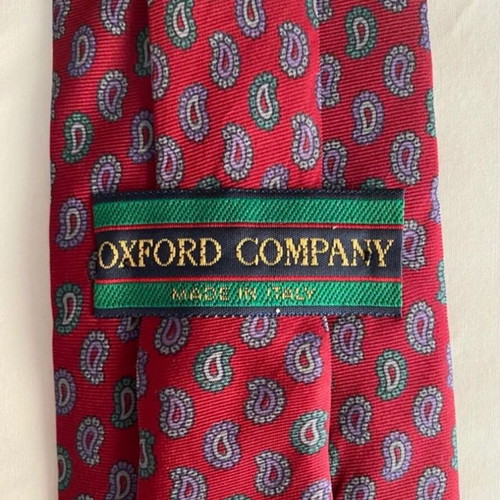 Silk tie Oxford Company used, red with green and purple paisley