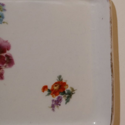 Porcelain tray used with flowers and golden accents