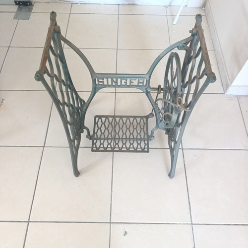 Vintage table console with Singer cast iron base and marble top used