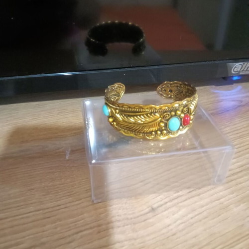 Ethnic bracelet like new, gold color with stones