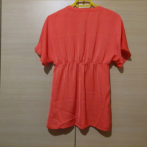 Coral satin-like blouse with V and rhinestones like new, size Medium