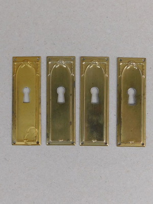Decorative brass covers for furniture locks