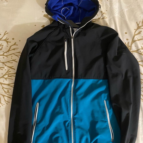 Jacket used, black with blue fleece inside, size S