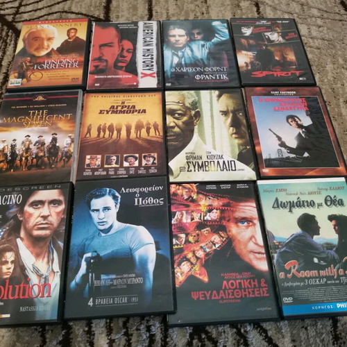 Collection of 60 used DVDs with classic and adventure movies