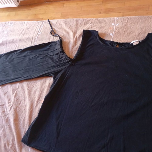 H&M black blouse with shoulder cutouts and cords, new