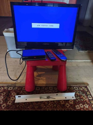 Grundig 22-inch TV with decoder and remote controls