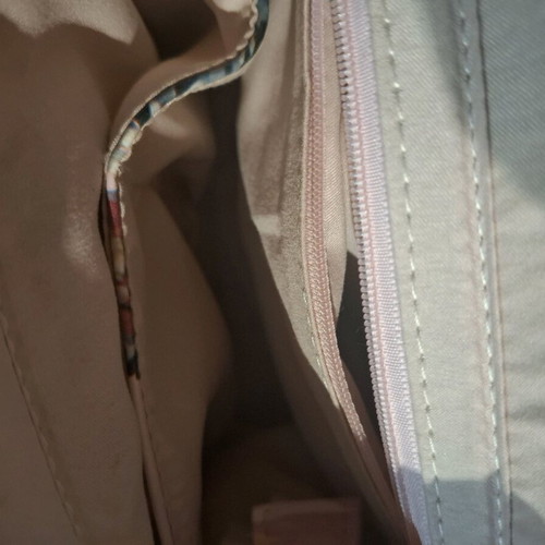Handbag like new, pink with floral pattern, multiple pockets and strap