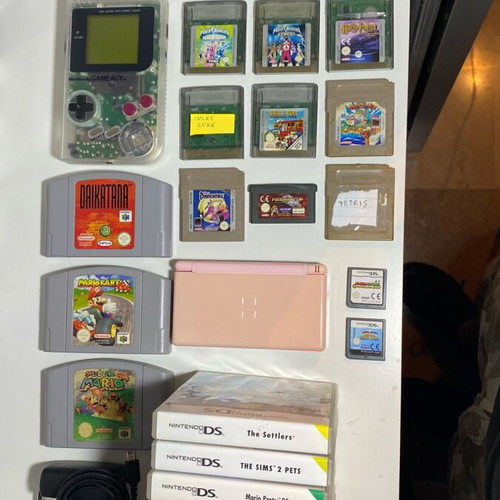Nintendo collection of used DS, Gameboy, and N64 consoles and games