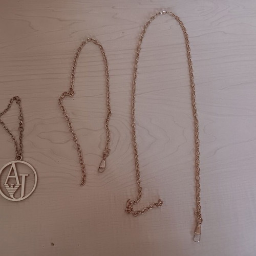 Bag decorations like new, gold color
