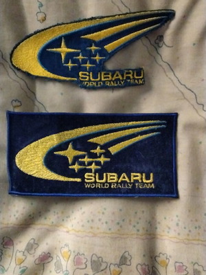 Σετ 2 ραφτά σήματα Subaru World Rally Team σαν καινούργιο
