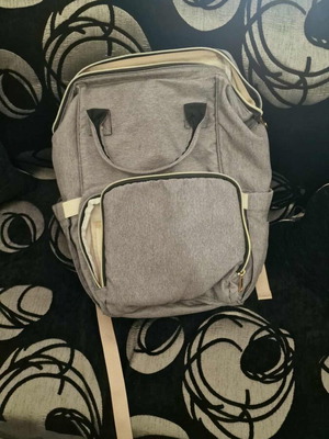 Grey backpack like new, spacious for everyday use
