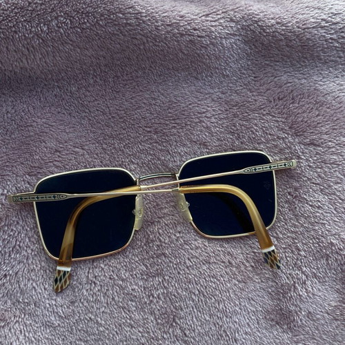 Gigi Hadid sunglasses authentic new gold with case and cloth