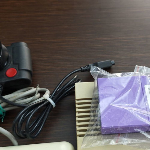 Commodore C64c personal computer with joystick and accessories