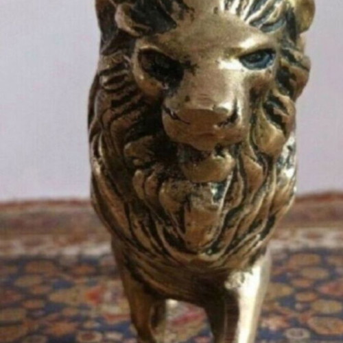 Solid bronze lion sculpture