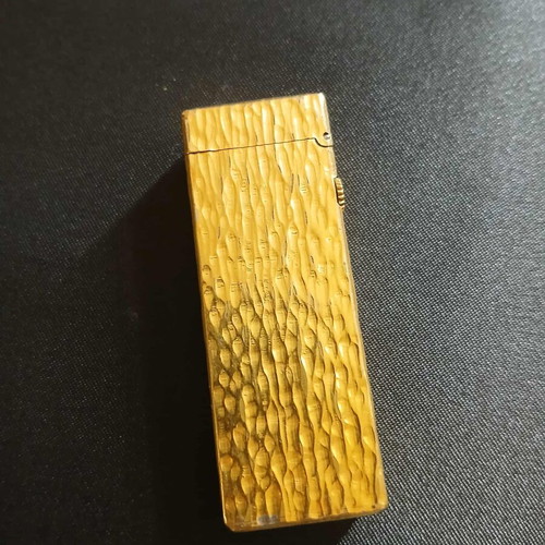Dunhill Rollagas lighter used with goldplated finish and embossed design