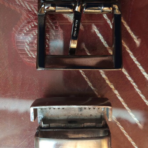 Four belt buckles
