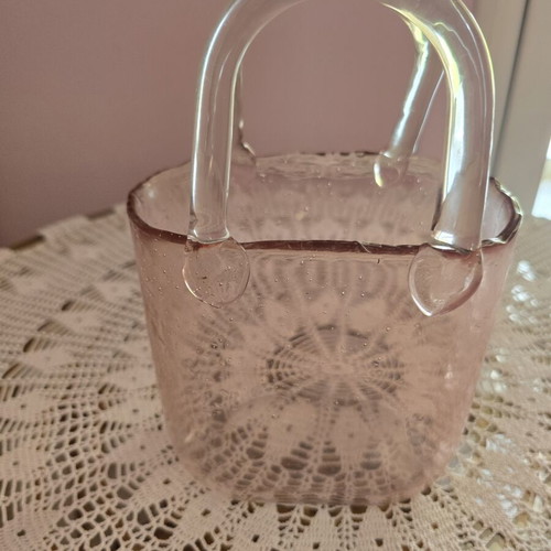 Glass vase with decorative flower arrangement