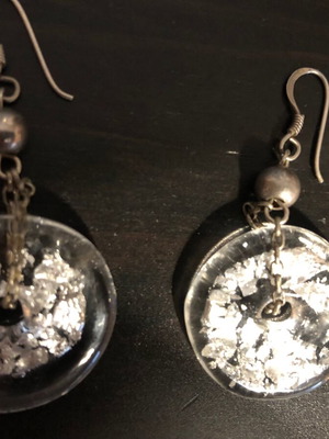 Earrings used, dangling with silver leaf transparent