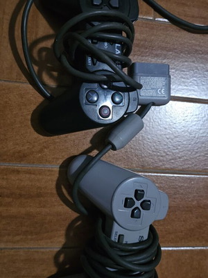 PlayStation 1 console with 2 controllers