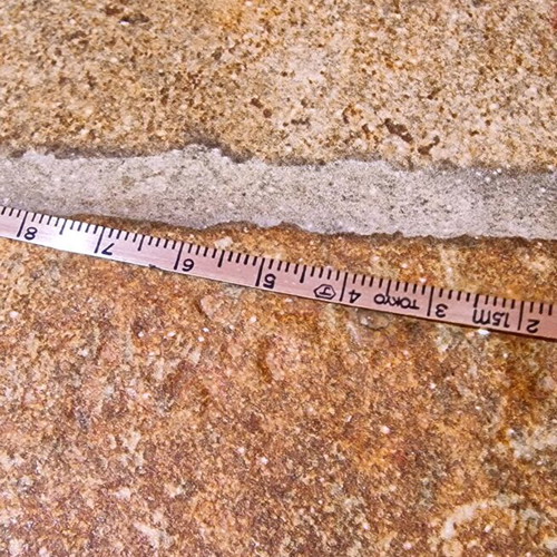 BP vintage keychain tape measure used