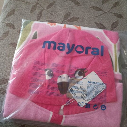 Branded poncho towel new in its packaging