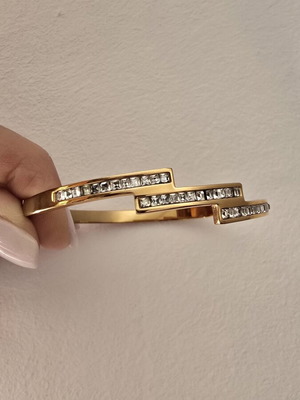 Steel bracelet in rose gold color with decorative stones, like new
