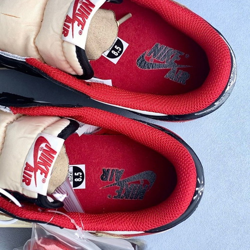 Nike Air Jordan 1 Low Black Red Reverse Swoosh custom sneakers