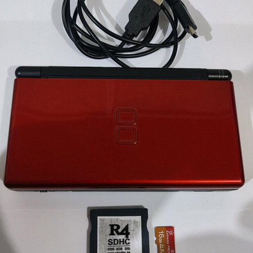Nintendo DS Lite console with Pokemon LeafGreen cartridge used