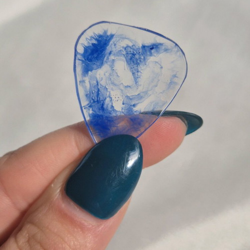 Blue guitar pick made of resin new