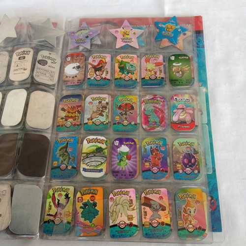 Collectible album with 132 Pokemon metal tags